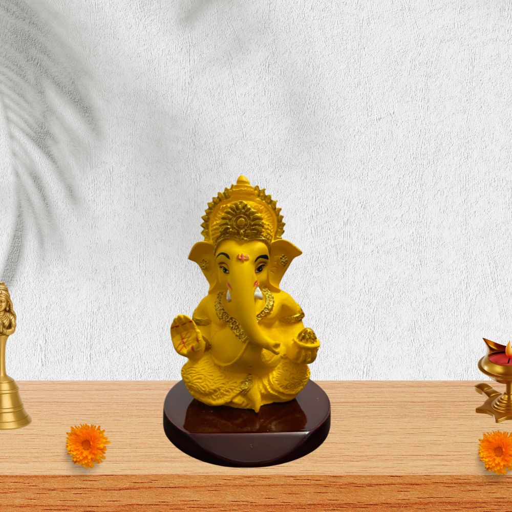 Ganesh Ji Idol with Modak – Yellow – 10 cm